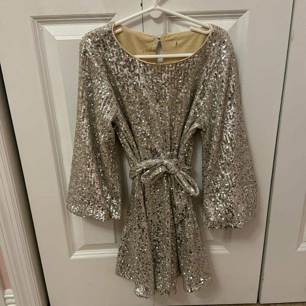 Sequin silver GB dress for a formal occasion.